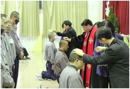 Inmates get baptized