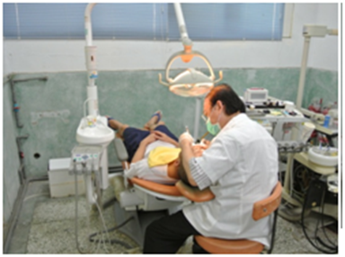 The dentist is treating the patient